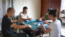 Mahjong gambling in the roadside cafe, complete with electric table